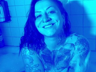 Tattooed Babe Splashing Around In Bubblebath