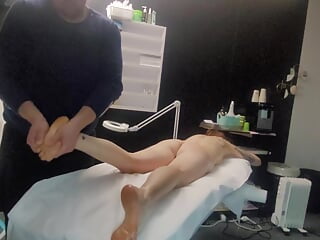 the masseur rubs oils into the body of his sexy wife he decided to fuck her pussy, then she started pegging his ass till cumshot